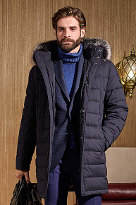 Удлиненный стеганый пуховик с капюшоном и меховой опушкой  (3333)